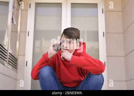 portrait of smiley teenager. dressing in a red shirt Stock Photo