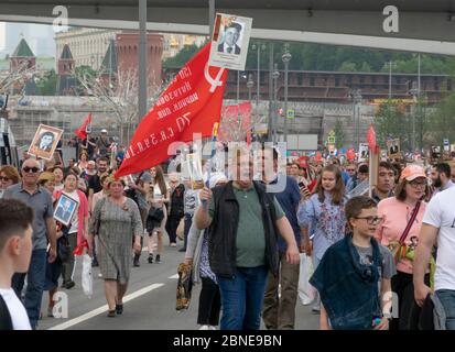 MOSCOW, RUSSIA , May 09, 2019: Over one million people of all ages take part in the Immortal Regiment parade celebrating the memory of loved ones fall Stock Photo