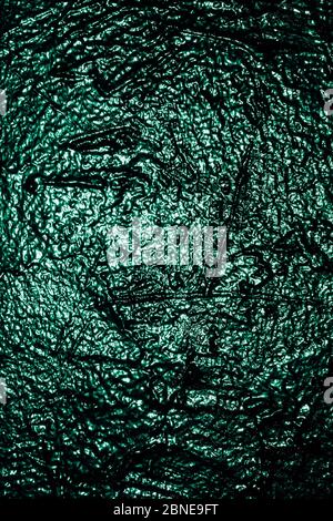 Green-lighted black wall of texture background light Stock Photo