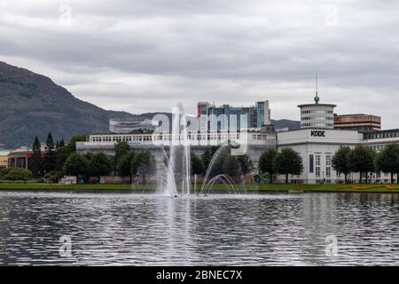 Bergen, Norway - September 09, 2019: Lake with fountain in Lille Lungeren park, Lille Lungegardsvannet pond, KODE museum building Stock Photo