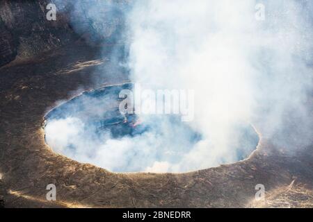 Steam rising from active lava lake in the crater of Nyiragongo Volcano, Virunga National Park, North Kivu Province, Democratic Republic of Congo. Sept Stock Photo