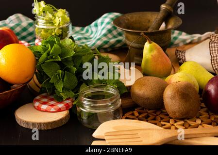 Retro still life with wine, cheese and fruits. Stock Photo