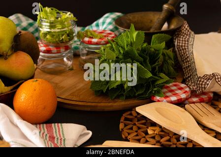Retro still life with wine, cheese and fruits. Stock Photo
