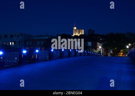 Windsor, Berkshire, UK. 14th May, 2020. Windsor Bridge with views of Windsor Castle was bathed in blue light this evening to show Windsor's appreciation for the NHS and all the wonderful work they are doing for patients during the Coronavirus Covid-19 Pandemic. Credit: Maureen McLean/Alamy Live News Stock Photo