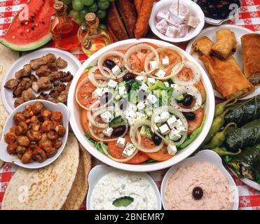 Greek meze selection with Greek salad, Corfu Old Town, Kerkyra, Corfu, Ionian Islands, Greece Stock Photo