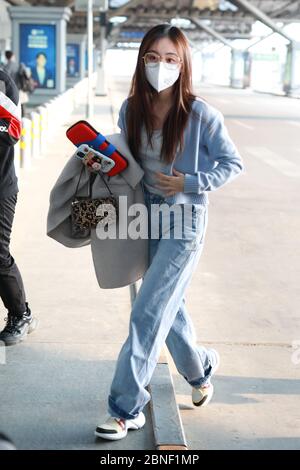 Chinese actress Zhu Xudan（Bambi Zhu）appears in one of the airports in Beijing, China, 9th April, 2020.(Bag: Alexander Wang) Stock Photo