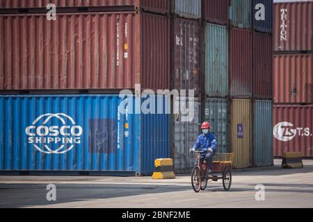 Containers are arrayed waiting to be delivered by cargo vessels at a port, Wuhan city, central China's Hubei province, 30 April 2020. *** Local Captio Stock Photo