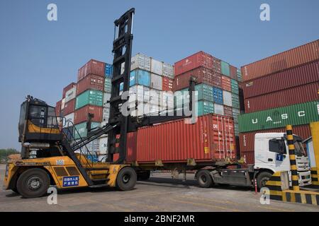 Containers are arrayed waiting to be delivered by cargo vessels at a port, Wuhan city, central China's Hubei province, 30 April 2020. *** Local Captio Stock Photo