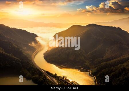 Aerial view of Meikou section of Ning Jing Yan Expressway in Guanxia Village in Shaoyang city, south China's Hunan province, 9 April 2020. Stock Photo