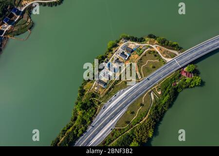 Aerial view of Meikou section of Ning Jing Yan Expressway in Guanxia Village in Shaoyang city, south China's Hunan province, 9 April 2020. Stock Photo