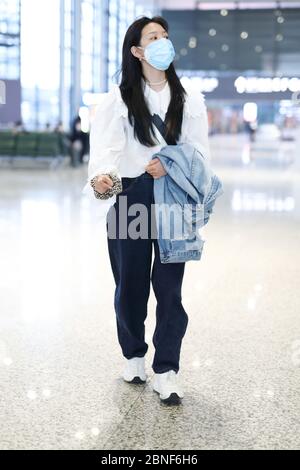 Chinese actress Zhang Ruonan arrives at a Beijing airport before