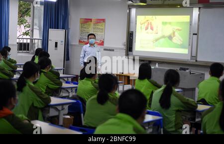 High grade students in Chongqing go back to school and restart classes officially, Chongqing, China, April 20, 2020. Students attending class. Stock Photo