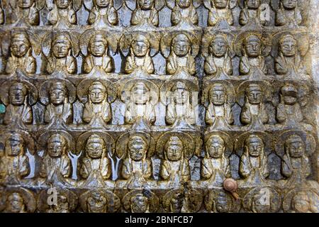 Carved stone Thousand Buddha stele