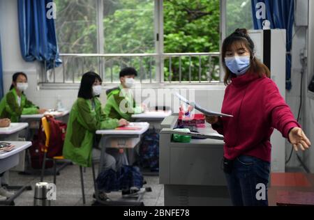 High grade students in Chongqing go back to school and restart classes officially, Chongqing, China, April 20, 2020. Students attending class. Stock Photo