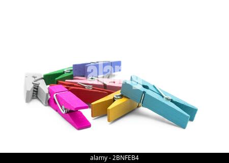 Colorful wooden clothespins isolated on the white background. Stock Photo