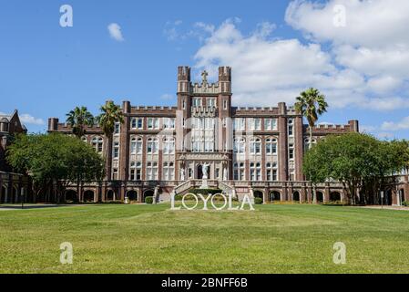Loyola University administration building and sign on St. Charles Avenue in New Orleans, Louisiana, USA