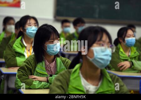 High grade students in Chongqing go back to school and restart classes officially, Chongqing, China, April 20, 2020. Students attending class. Stock Photo
