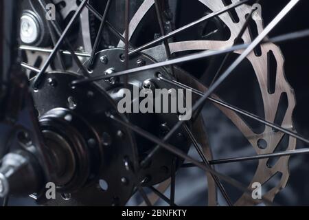 bicycle disk brake installed in front wheel Stock Photo
