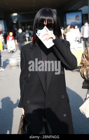 Chinese television and film actress Tan Zhuo arrives at a Changsha airport after landing in Changsha city, south China's Hunan province, 14 April 2020 Stock Photo