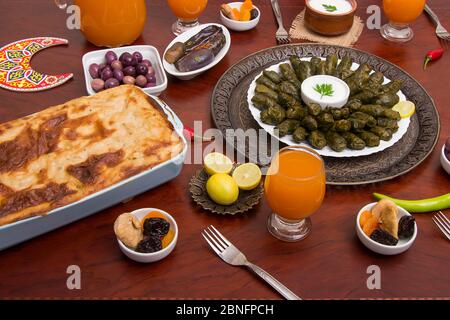 Mahshi or Mahshy - Egyptian traditional cuisine - Grape leaves stuffed rolls with yogurt Stock Photo