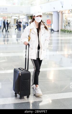Chinese actress Lai Yumeng arrives at a Beijing airport before ...