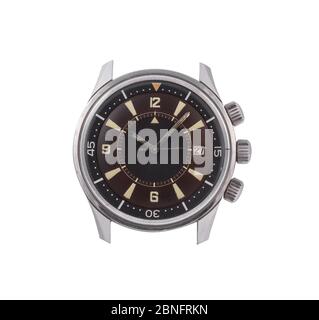 Closeup of a watch without a band under the lights isolated on a white background Stock Photo