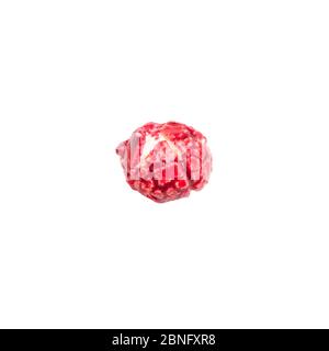 red popcorn close-up on white background Stock Photo