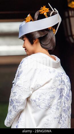 Japanese bride wearing traditional kimono and headdress just before the wedding ceremony at Meiji Jingu shrine, Tokyo Japan Stock Photo