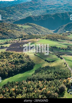 Bird's eye view on woodland and cultivated fields from the top of the Stone of Bismantova. Reggio Emilia province, Emilia Romagna, Italy. Stock Photo