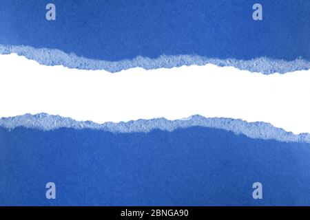 Ripped pieces of blue paper isolated on white background. Paper piece torn edge. Rip sheet paper tears. Copy space, frame, banner, trend 2020 Stock Photo