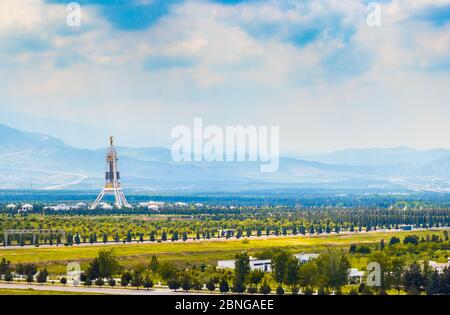 2 May 2020; Monument of Neutrality in Ashagabat, Turkmenistan on a bright cloudy day Stock Photo