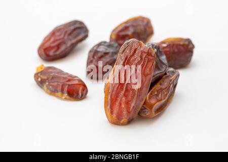 pitted dates isolated on white background Stock Photo