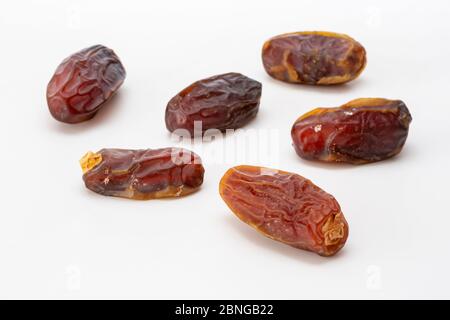 pitted dates isolated on white background