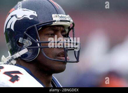 Denver Broncos linebacker Keith Burns jokes with teammates as the team  stretches before taking part in their first football practice following a  bye week for the Broncos in Denver on Monday, Oct.