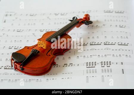 violin on note paper Stock Photo