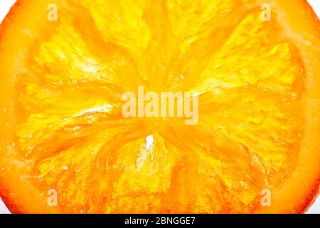 Slices Dried oranges or tangerines isolated on a white background. Vegetarianism and healthy eating Stock Photo