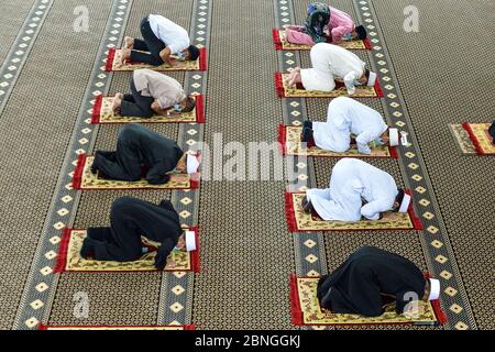 Seremban, NEGERI SEMBILAN, MALAYSIA. 15th May, 2020. Muslim clerics performs a congregational Friday prayer at the State Mosque in Seremban, for the first time since the Movement Control Order (MCO) was implemented last March 18.The Religious Affairs Minister earlier allowed Friday prayers, alongside other prayers to be performed during the Conditional Movement Control Order (CMCO) at mosques nationwide with limited attendees and social distancing measures being put in place. Credit: Fuad Nizam/ZUMA Wire/Alamy Live News Stock Photo