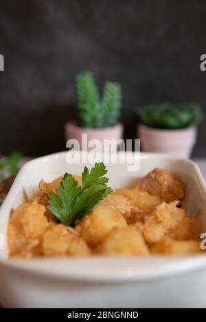 tuna and potato stew called marmitako. Traditional Basque recipe with tuna, potatoes and onion. Spanish food Stock Photo