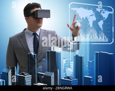 The man with virtual reality goggles doing urban planning Stock Photo