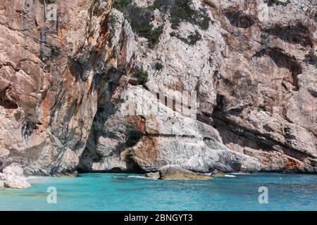 Paradise glimpse of Cala Mariolu, Gulf of Orosei, Sardinia. Stock Photo