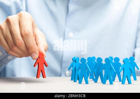 Staff recruitment. Choosing a good leader. Boss keeps subordinate. Stock Photo