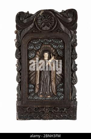 Vertical shot f a carved wood statue of mother Mary holding Jesus isolated Stock Photo