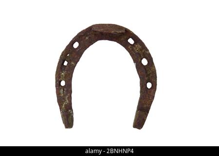 Old worn rusty horseshoe on white background Stock Photo