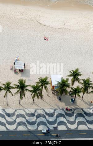 Elevated view of the beach with the famous wavy dragons tooth paving on Avenida Atlantica, Copacabana, Rio de Janeiro, Brazil, South America Stock Photo