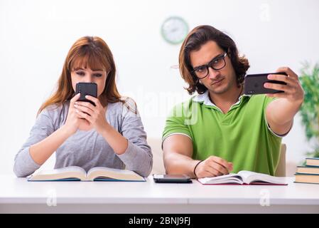 Students in gadget dependency concept Stock Photo
