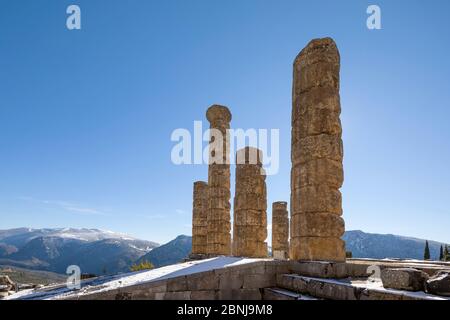 Ruins of the Apollo temple in Delphi archaeological site in Greece Stock Photo