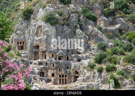 Necropolis of Lycian rock-cut tombs of the ancient city of Myra in Demre, Antalya Province, Turkey Stock Photo