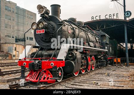 0751 steam locomotive outside ACE Cafe, Beijing China seen in winter Stock Photo