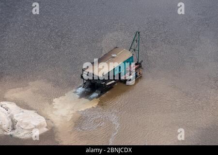 Aerial view of gold dredger in Essequibo river, GuyanaSouth America Stock Photo
