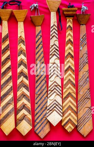 Woodan Tie Hanging on the wall. Wooden Striped Tie,Souvenir Tie Stock Photo